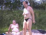 Two lesbians - stripping at the lake