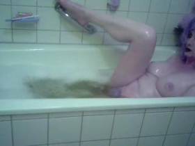 Dildo play in the bathtub