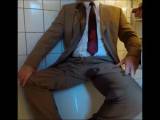 Piss on a guy in a suit