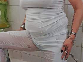 Pee in a white outfit and black thong