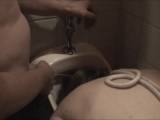 Shemale pissed in the men's toilet and punished!