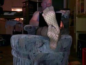 Caught nylon carrier in fishnet tights