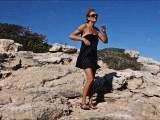 In a micro bikini on the cliffs