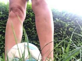 Soccer ball and bare feet
