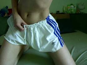 Gym shorts and a blue Dildo