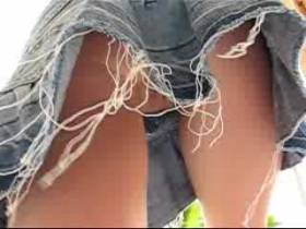 Secretly filmed naked under skirt