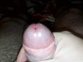 Closeup of John getting himself a hardon