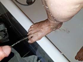 The feet showered with piss