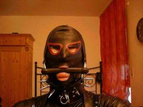 Gagged and masked