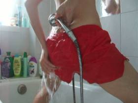 Red gym shorts in the shower