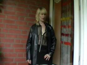 pissing in a leather coat