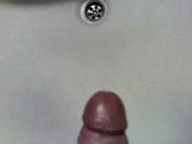 Horny masturbating on washbasin 2
