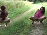 Two girls pissing