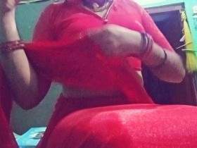 Indian Gay Crossdresser Gaurisissy in Red Saree showing and pressing his Big Boobs