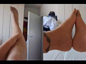 Feet of nylonjunge in pantyhose