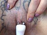 Clit piercing stimulated with vibrator