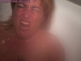 In the bathtub piss in the face