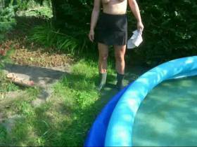 with rubber boots in the pool