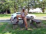Dreister outdoor Public Piss in transparent mini chain dress with anal plug on full rest area