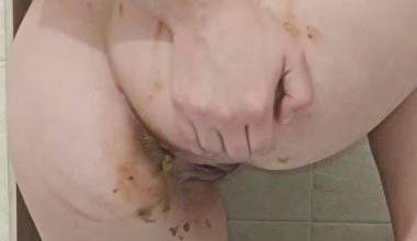 Anya plays with poop