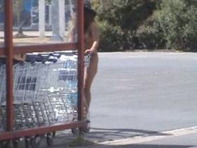 Naked in supermarket parking lot