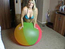 Naked on the big beach ball