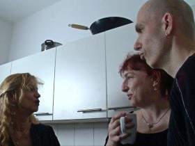 Threesome in the kitchen with the swinger couple
