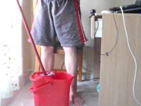 John is Peeing all into the Cleaning Bucket