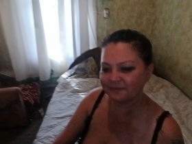 Posing of a dark-haired woman