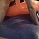 pounding cheap inflatable doll on blue waterbed