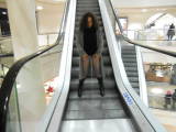 Nylonpiss down the escalator at the Center