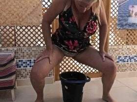 peeing in the bucket