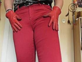 bang tight red satin pants and red leather gloves