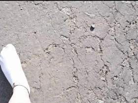 White sneaker socks in the puddle