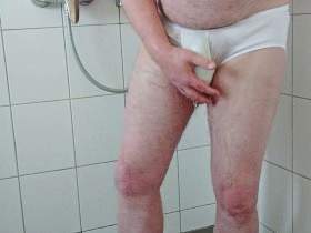 Pissing and showering after a walk in white underpants