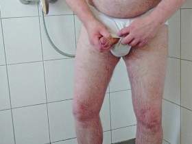 Pissing and showering after a walk in white underpants