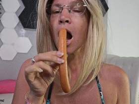 The sausage is fucking me! Do you have a sausage like that? Well, I mean a Vienna sausage! The little sausage feels very comfortable in my pussy and is all slimy. Look how wet I get down there.