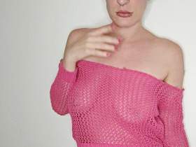 Posing video: glasses and pink fishnet top