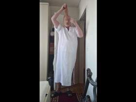 Carmen Nylonjunge in white caftan and pantyhose