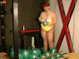 Balloon fun in a bathing suit