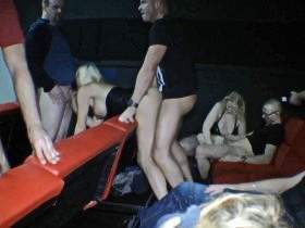 Group fuck in a porn cinema