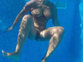 Nude in the pool - underwater camera