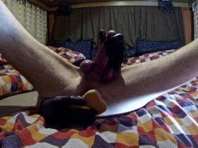 Tied eggs, butt plug and dildo