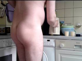 Naked in a strange kitchen