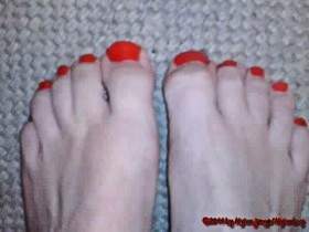 Barefoot and red nails