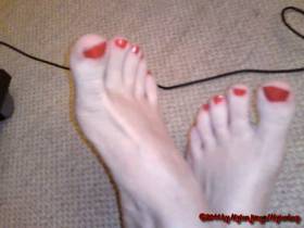 Barefoot and red nails
