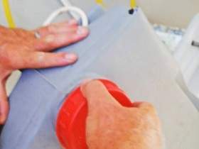 Empty the waste-holding tank