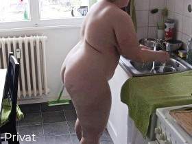 Naked in the kitchen