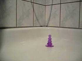 Anal dildo fucking in the shower