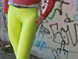 Yellow leggings by the parking garage